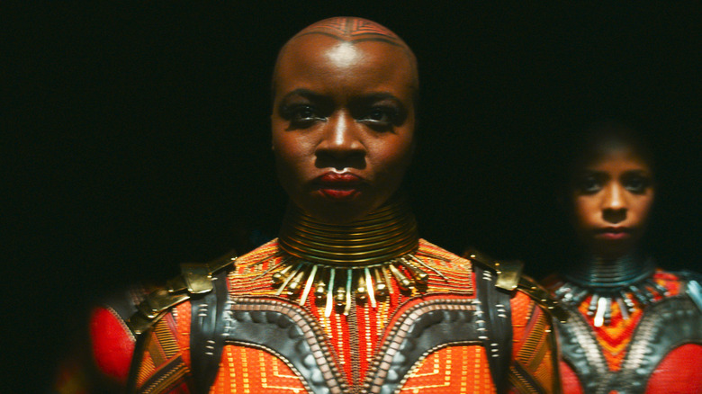 Danai Gurira shadows red suit Black Panther: Wakanda Forever