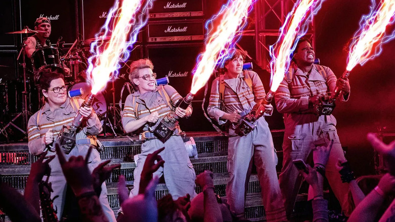 Ghostbusters shooting proton streams at a concert