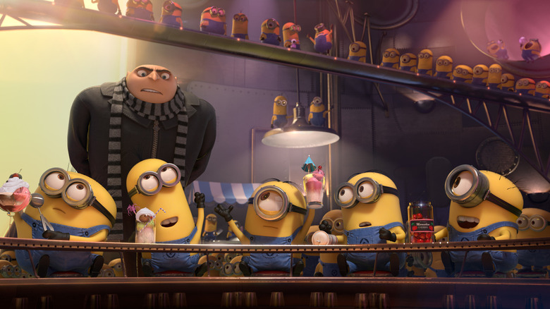 Gru observing some Minions partying