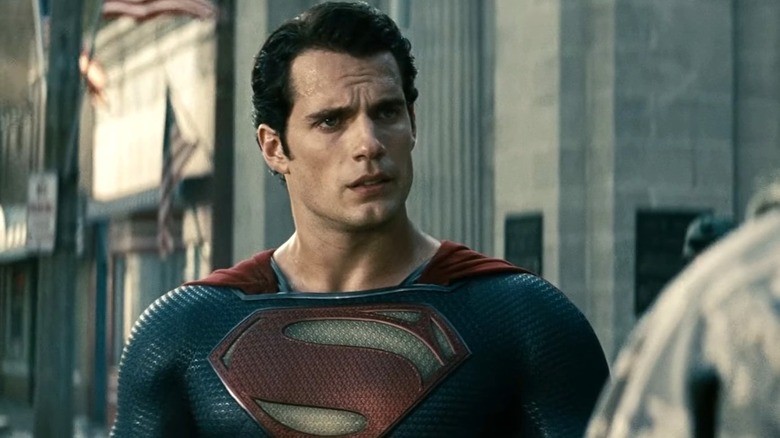 Henry Cavill as Superman looking at another man in Man of Steel