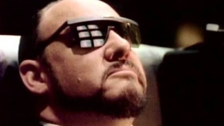 John Rhys-Davies wearing sunglasses as Kingpin