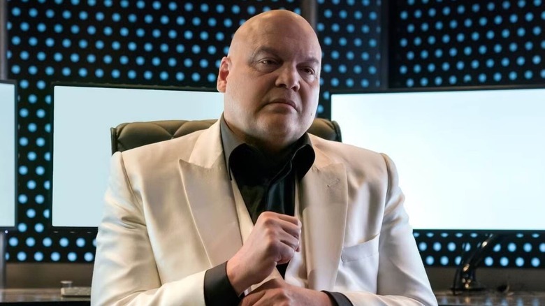 Kingpin sat down in white suits