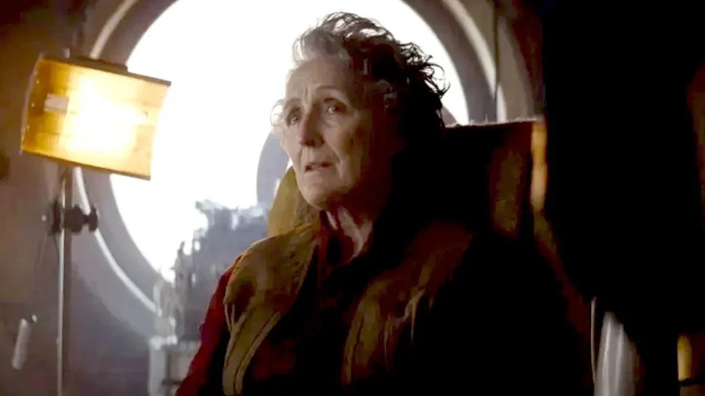 Fiona Shaw sitting lamp wild hair