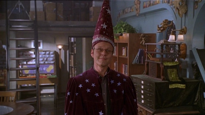 Buffy TVS' Giles smiling in magic shop