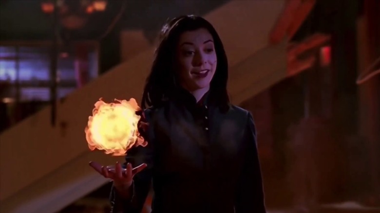 Buffy TVS' Dark Willow holds fireball 