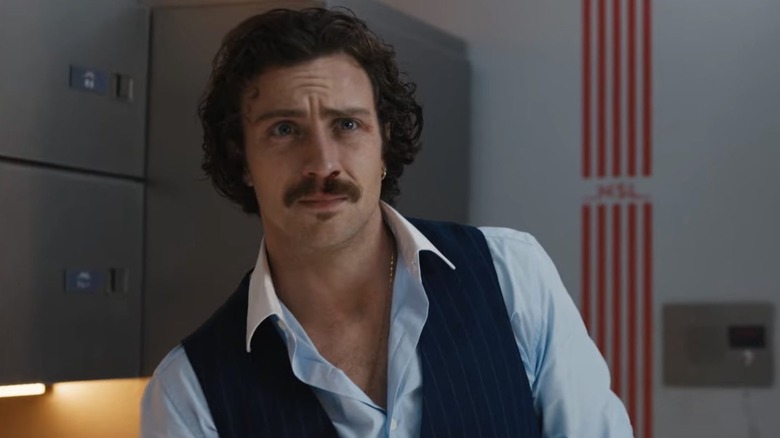 Aaron Taylor-Johnson grimacing in Bullet Train