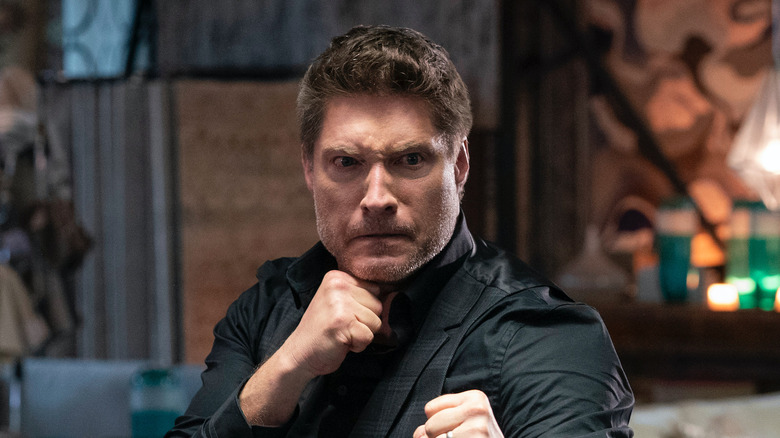 Sean Kanan Mike Barnes Cobra Kai raised fists