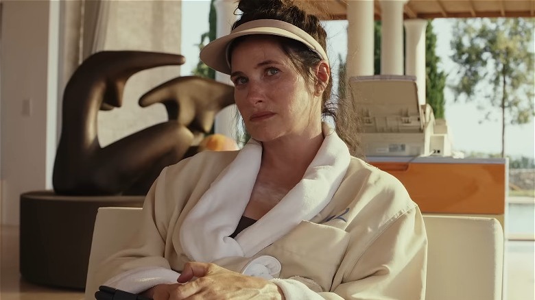 Kathryn Hahn as Claire Debella in lounge robe Glass Onion