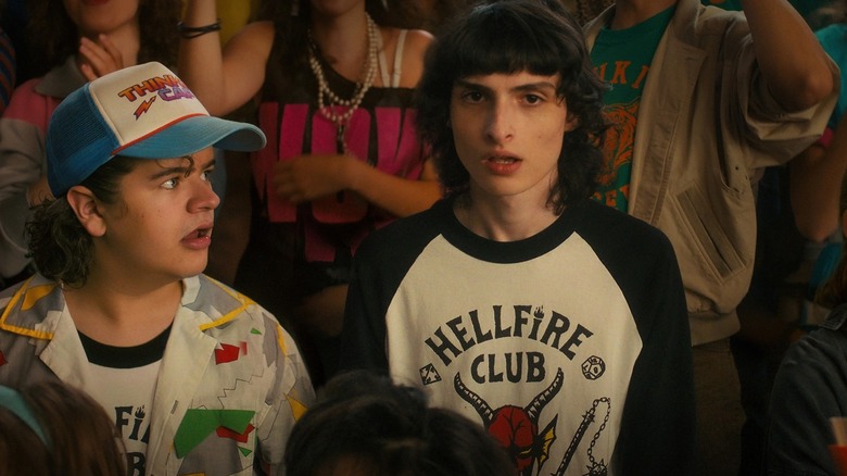 Finn Wolfhard as Mike wears Hellfire Club shirt