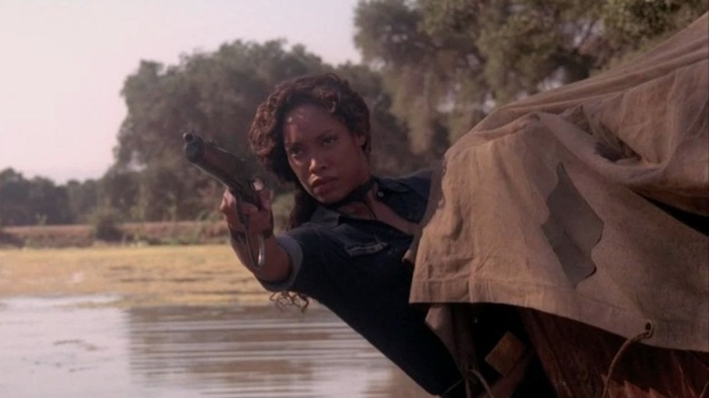 Gina Torres wagon shotgun river