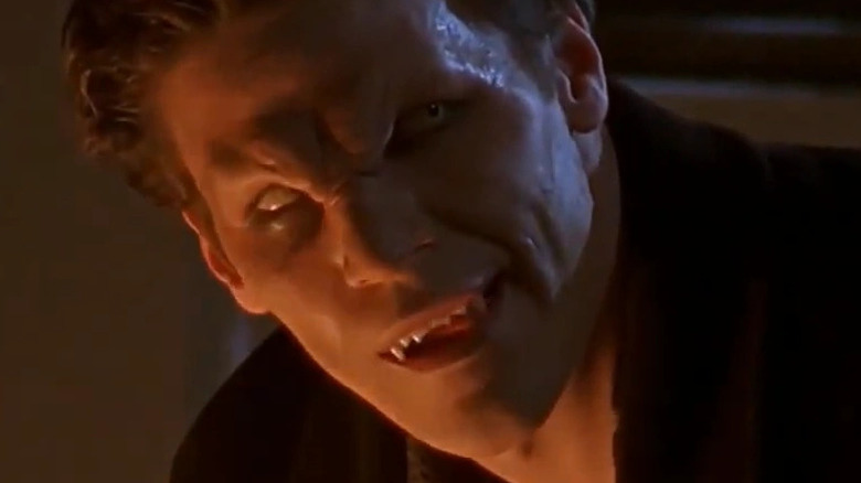 Angelus snarling in the shadows on Buffy the Vampire Slayer