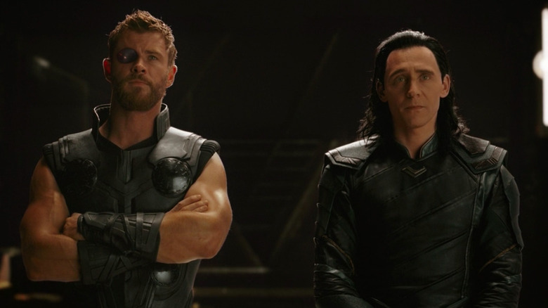 Thor and Loki watch as Thanos' ship approaches