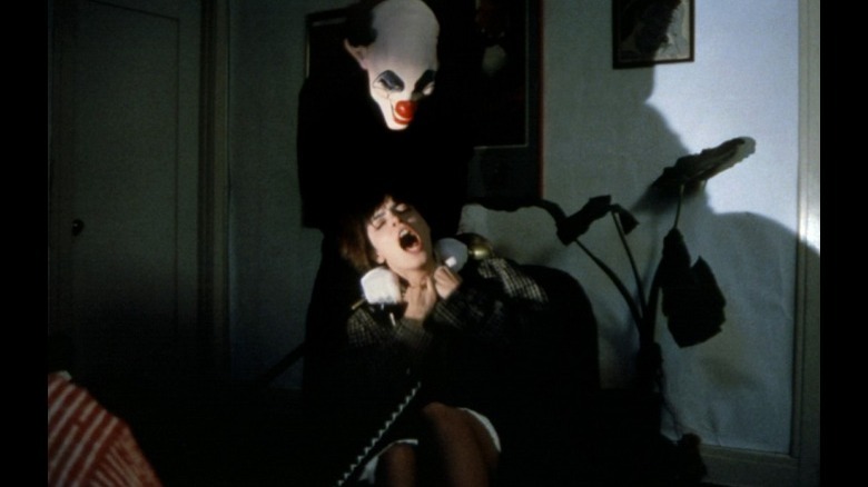 Out of the Dark's Bobo the Clown strangling woman