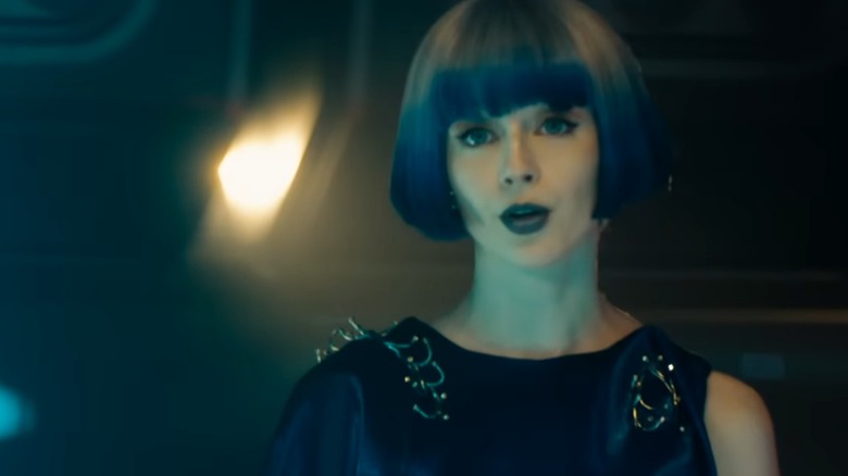 Kacey Rohl's Rachel, wearing a blue wig and lipstick, in Star Trek: Section 31