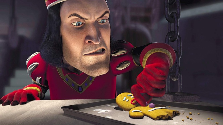 Lord Farquaad grabs one of Gingerbread Man's gumdrop buttons in Shrek