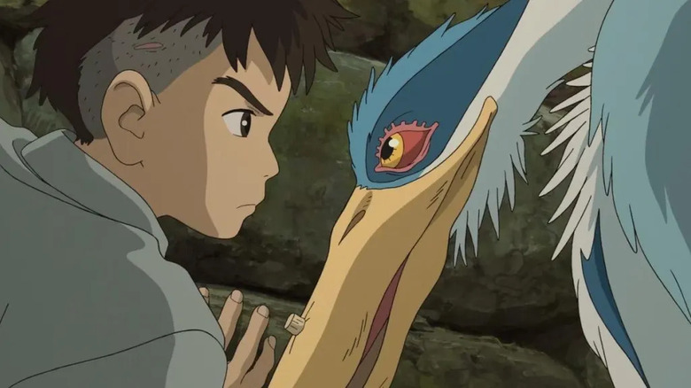 Mahito and the Heron stare each other down in The Boy and the Heron