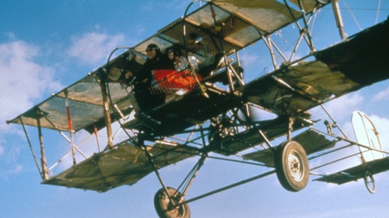 Kenneth Branagh and Helena Bonham Carter on plane in theory of flight