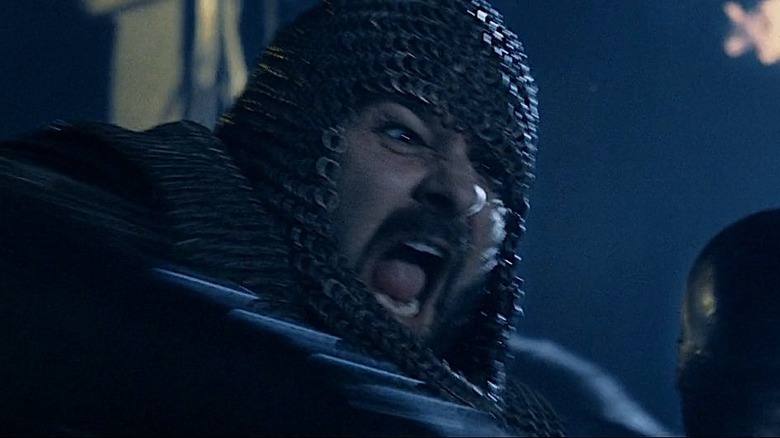 Close up of a screaming warrior in chainmail in The Two Towers