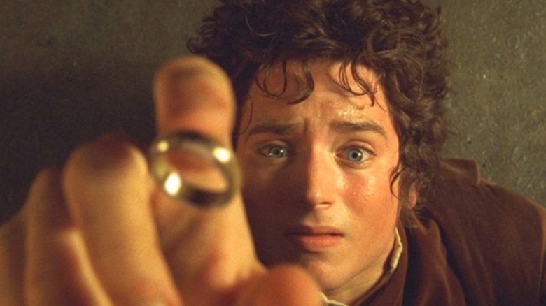 Frodo reaches for One Ring The Fellowship of the Ring