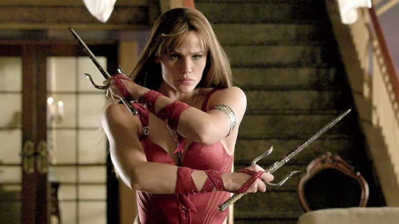 Jennifer Garner as Elektra wielding sais