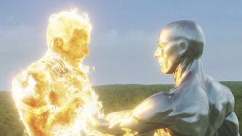 The Human Torch and Silver Surfer face off. 