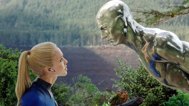 Jessica Alba as Sue Storm stares at a hovering Silver Surfer in Fantastic Four: Rise of the Silver Surfer