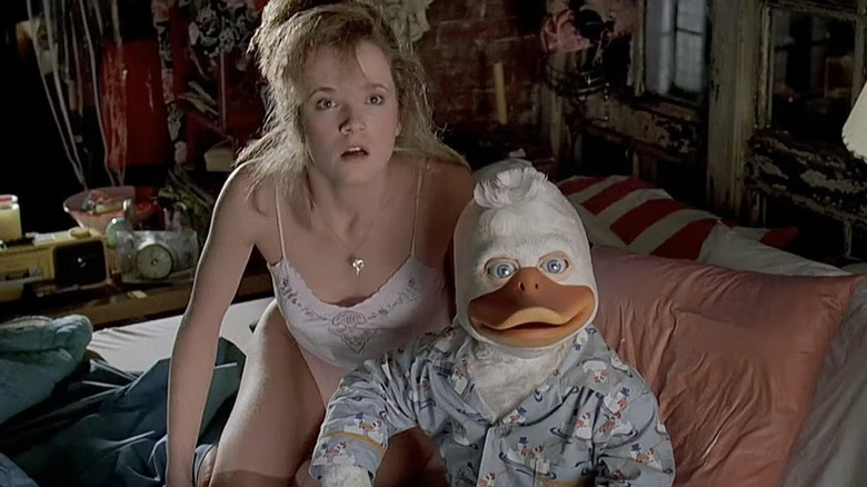 Lea Thompson and Howard the Duck in bed