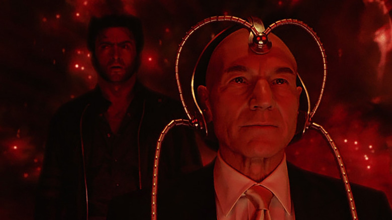 Patrick Stewart as Professor X uses Cerebro as Hugh Jackman as Wolverine watches in X2: X-Men United