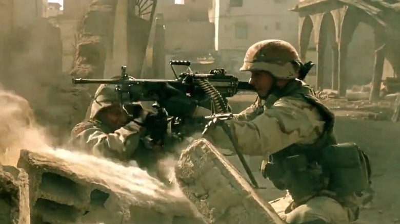 Soldier firing weapon in "Black Hawk Down"