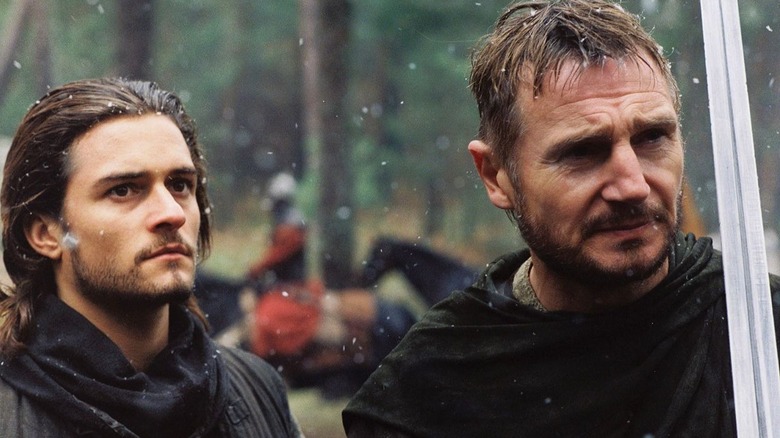 Orlando Bloom and Liam Neeson with sword