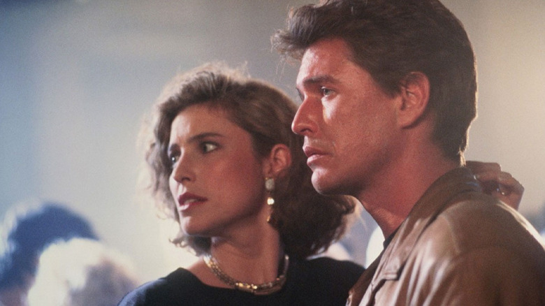 Mimi Rogers and Tom Berenger