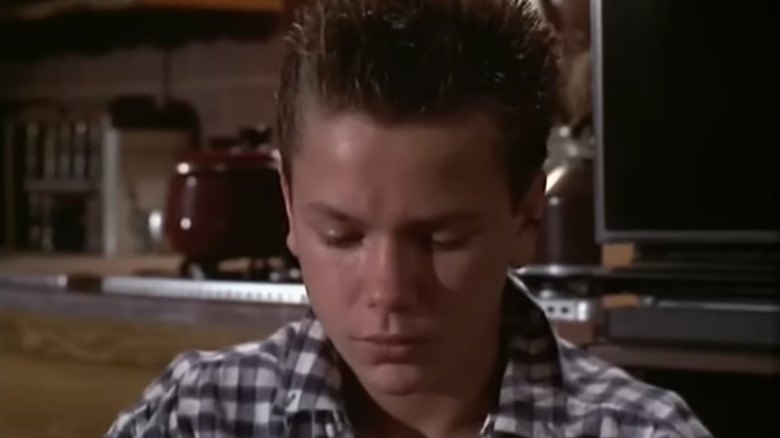 River Phoenix as Chris looking down in Circle of Violence