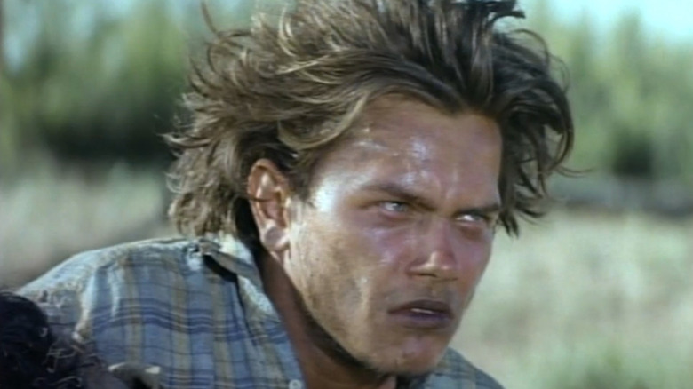 River Phoenix as Talbot Roe looking agitated in Silent Tongue