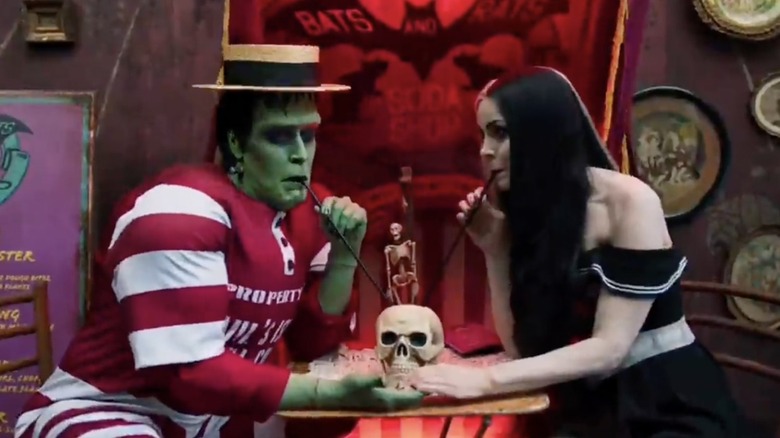 Jeff Daniel Philips and Sherri Moon Zombie in The Munsters