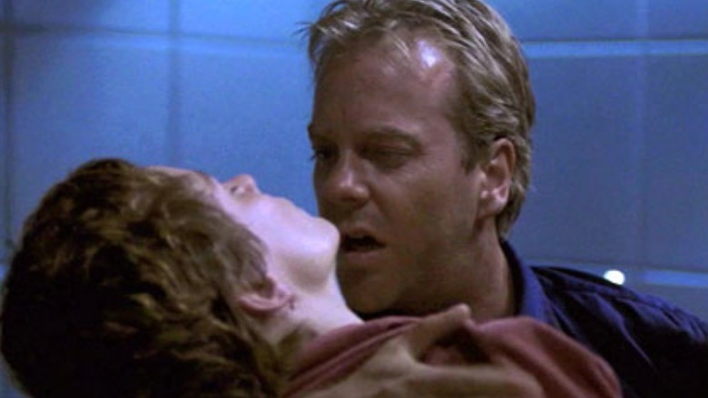 Jack Bauer holds Teri Bauer 24