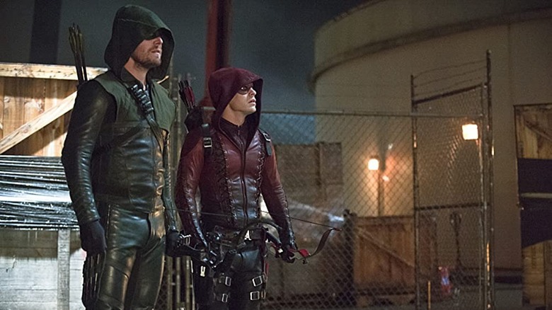 Arrow's Green and Red Arrow stand together