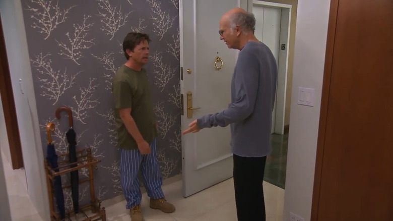 Larry David talking to Michael J. Fox