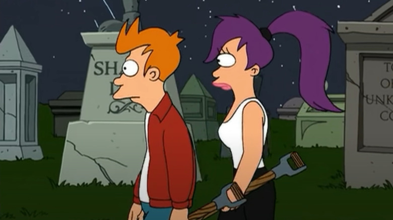 Fry and Leela walking through cemetery