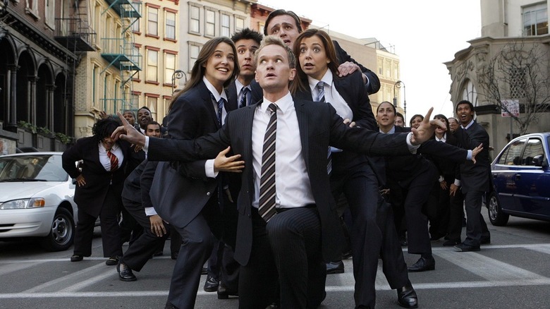 Barney, Robin, Ted, Marshall, and Lily performing Girls vs. Suits on How I Met Your Mother