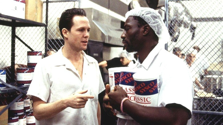 Ryan O'Reily and Simon Adebisi standing in the kitchen