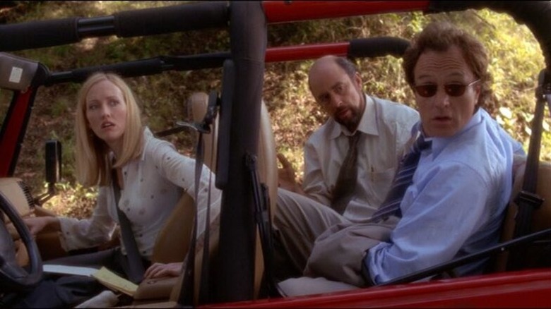 Moss, Ziegler, and Lyman in a jeep