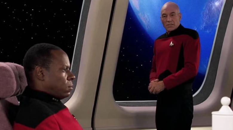 Picard (Patrick Stewart) speaks with Sisko (Avery Brooks) in Star Trek: Deep Space Nine