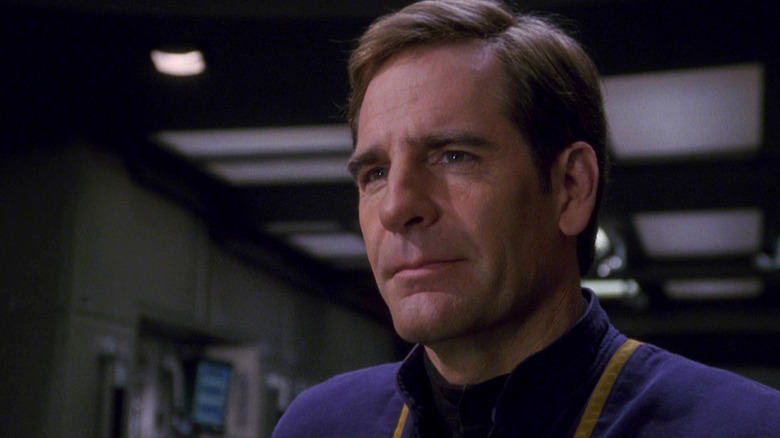 Archer (Scott Bakula) stands in a corridor in Star Trek: Enterprise