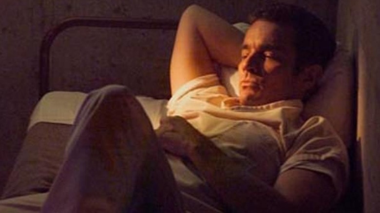 james marsters as ted bundy lounging in prison