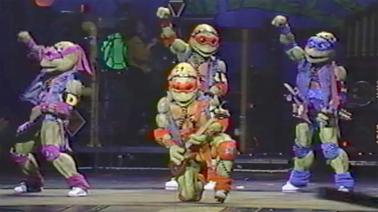 The TMNT rocking out on stage