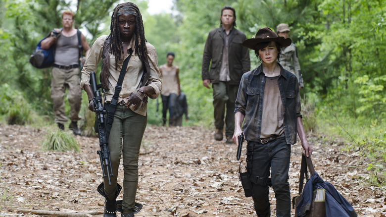 Michonne and Carl lead a group