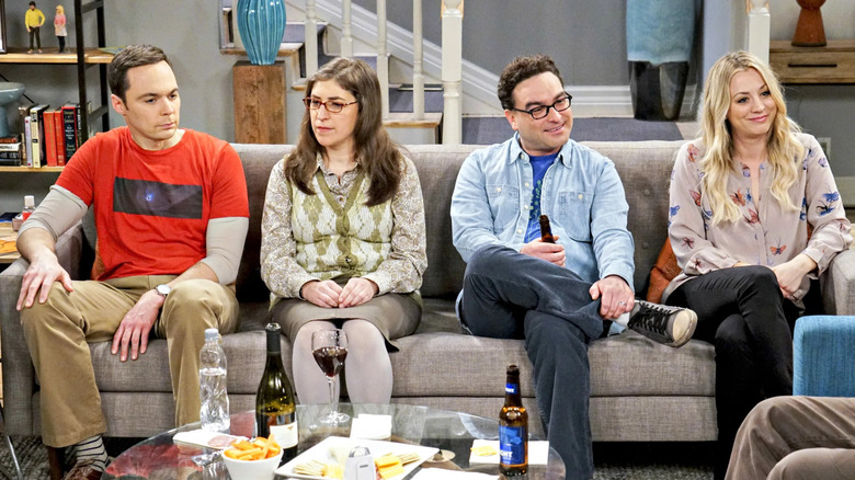 Sheldon Amy Leonard and Penny sitting on a couch on The Big Bang Theory