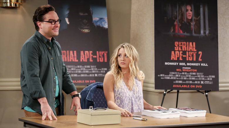 Leonard and Penny signing autographs for Serial Ape-ist on The Big Bang Theory