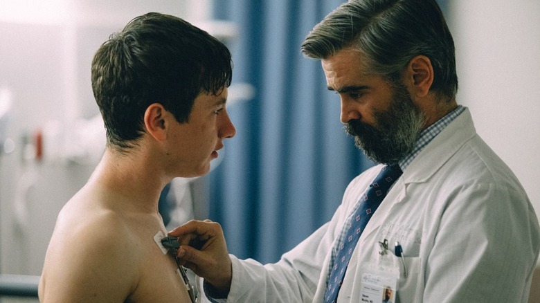 Colin Farrell examines Barry Keoghan in The Killing of a Sacred Deer