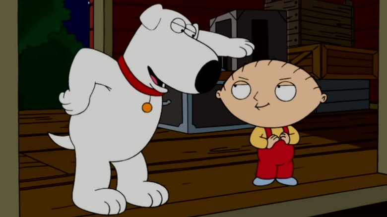 Brian and Stewie singing on a train in Family Guy's Road to Rhode Island